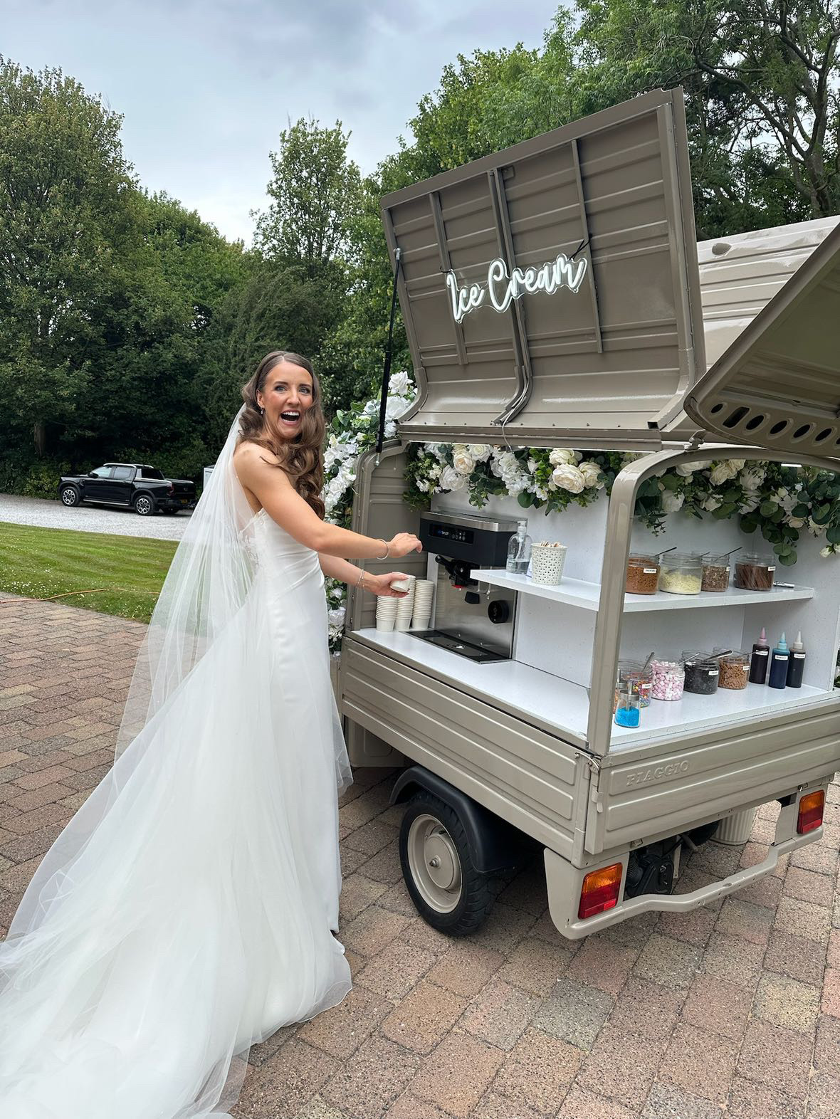 Bride pulling her own soft-serve ice cream at a wedding